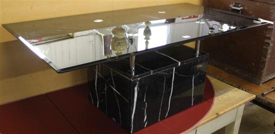 Glass-topped marble coffee table